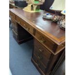 A oak early 20th century twin pedestal writing desk Location: