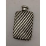 A Victorian small silver spiral embossed flask by Sampson and Mordan, 22.5g Location: