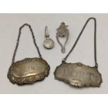 An Edwardian silver napkin hook together with two silver decanter labels and other items, 33.4g