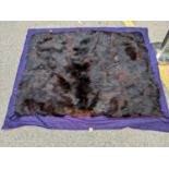 A 1920's bear fur rug on a felt backing Location: condition: strong odour