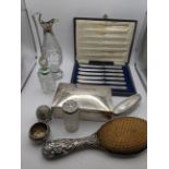 Mixed silver and silver plate to include a silver cigarette box, a silver backed hairbrush, silver