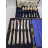 A cased set of six silver handled butter knives A/F, Sheffield 1909; along with five silver