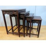 A nesting set of four Chinese 20th century carved wooden occasion table Location: