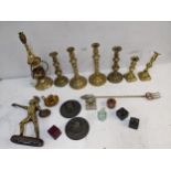 Brassware to include candlesticks, a figure, a collection of inkwells Location: