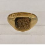 An 18ct gold gent's signet ring having engraved initials, total weight 7.9g Location: