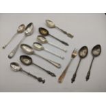 Silver and silver coloured metal teaspoons and a fork, 118g Location: