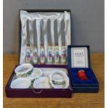 A small mixed lot to include a Halcyon Days enamelled pill box, six Asprey fine bone china napkin