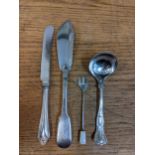 Small pieces of silver to include a miniature soup ladle with a fish knife, a butter knife and a