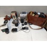 Photographic equipment to include a Rollei flash, a Pentax MG lenses, accessories, and a Bolex