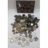 A mixed British and world coins to include George V Shillings, mixed pennies and later examples,