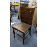 A 1930's Bond & Sons oak trouser press chair Location: