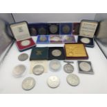 A mixed collection of coins to include a silver Proof Silver Jubilee and Charles and Diana Crowns,