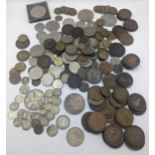 A mixed collection of world coins to include a 1924 'Eagle' Dollar and later USA coins to include