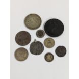A mixed group of coinage to include a Queen Elizabeth I sixth issue sixpence A/F converted to a