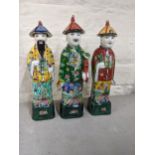 Three Chinese porcelain polychrome enamel immortal figures Location: