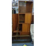 A mid 20th century Staples Ladderax system consisting of five teak cabinets, one large shelf, four