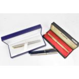 A Waterman 'hémisphère' fountain pen, in stainless steel with gilt ring and clip, in original box