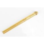 A Must de Cartier gold plated ballpoint pen with push button to lid bringing the clip out