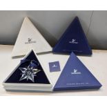 Four boxed Swarovski Christmas ornaments, 2001,2001, 2002 and 2003 Location: