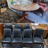 A set of eight retro black vinyl and teak dinning chairs possibly by Burgess together with a teak