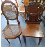 A Regency mahogany hall chair together with a French style cane back and cane seat bathroom chair