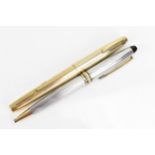 A Sheaffer gold-plated fountain pen, with 14ct yellow gold nib, stamped 585, of tapered form with