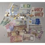 A collection of World coinage and bank notes to include Britain, Turkey, Venezuela examples