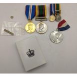An Elizabeth II 'The Cadet Force Medal' awarded to TGT Maguire ACF, and 2002 Jubilee Medal, together