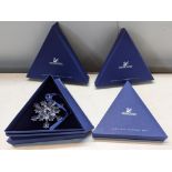Four boxed Swarovski Christmas ornaments, 2004, 2005, 2007 and 1996 in a 2006 box