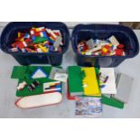 Two tubs of assorted vintage and other Lego to include mixed bricks, buses, semi built vehicles,