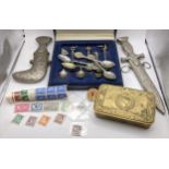 A mixed lot to include a WWI 1914 Christmas tin, along with mixed stamps, silver and silver plated
