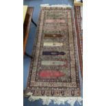 A Persian part silk rug with repeated Mihrabs Location: