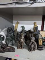 A selection of platinated bronzed composition, resin and metal statues and figurines, terracotta