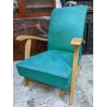 A mid 20th French beech and vinyl upholstered armchair Location: