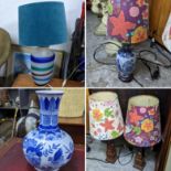 Lamps to include two Chinese blue and white examples, a pair of obelisk style lamps and another