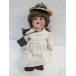 Armand Marseille porcelain headed doll No990/4 Location: