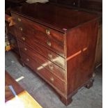 A 19th century mahogany chest with a secretaire drawer over three long drawers, on bracket feet,