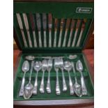 A wooden craved Cressida community plate cutting set Location: