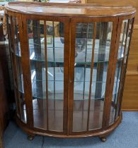 A mid 20th century walnut bow fronted display cabinet on short cabriole legs, 117h x 106w, Location: