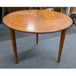A mid 20th century Norwegian Norsk Design Ltd teak circular table on tapering legs 49.5cm h x 68cm w