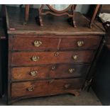 An early 18th century oak chest of two short and three long drawers, on bracket feet, 95.5cm h x