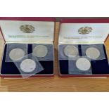 A pair of boxed 1965 Gardiners Island proof sets, comprising three coins each, in original