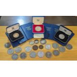 A mixed group of coins to include Queen Victoria 1858 penny and half penny, a pair of silver