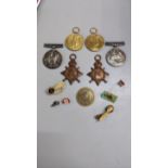 A collection of WWI medals awarded to possibly brothers to include British war medal, Victory