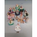 Mixed dolls to include a Victorian bisque headed doll in hand worked clothes, seven dolls in