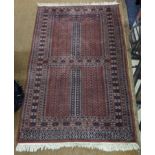 A handwoven Bokhara rug having repeating motifs and multiguard borders 155cm x 95cm, together with a