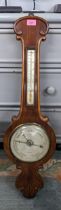 A Victorian walnut barometer, the silvered dial signed P Pedrini, 90.5h Location: