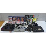 Playstation 1 or 2 and a Sega Mega Drive including controllers and games for three consoles to