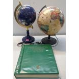 Two globes, one electric, marked 1992 made in Denmark, the other one made of Lapis Lazuli and