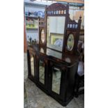 A late Victorian mahogany and marquetry inlaid chiffoniere, having a mirrored top with cupboards